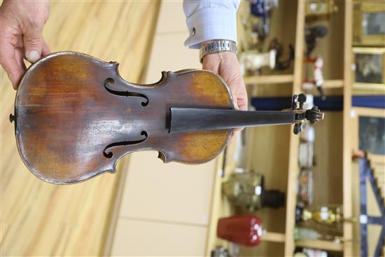 A late 19th century German violin, bears Stradivarius label, cased with bow, back 36cm
